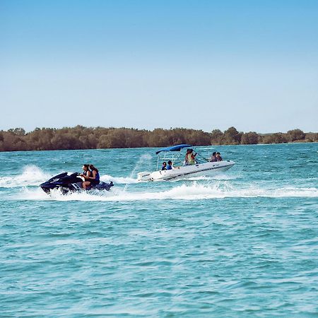 The Wb Abu Dhabi, Curio Collection By Hilton Hotel Exterior photo Boating on the Murray River