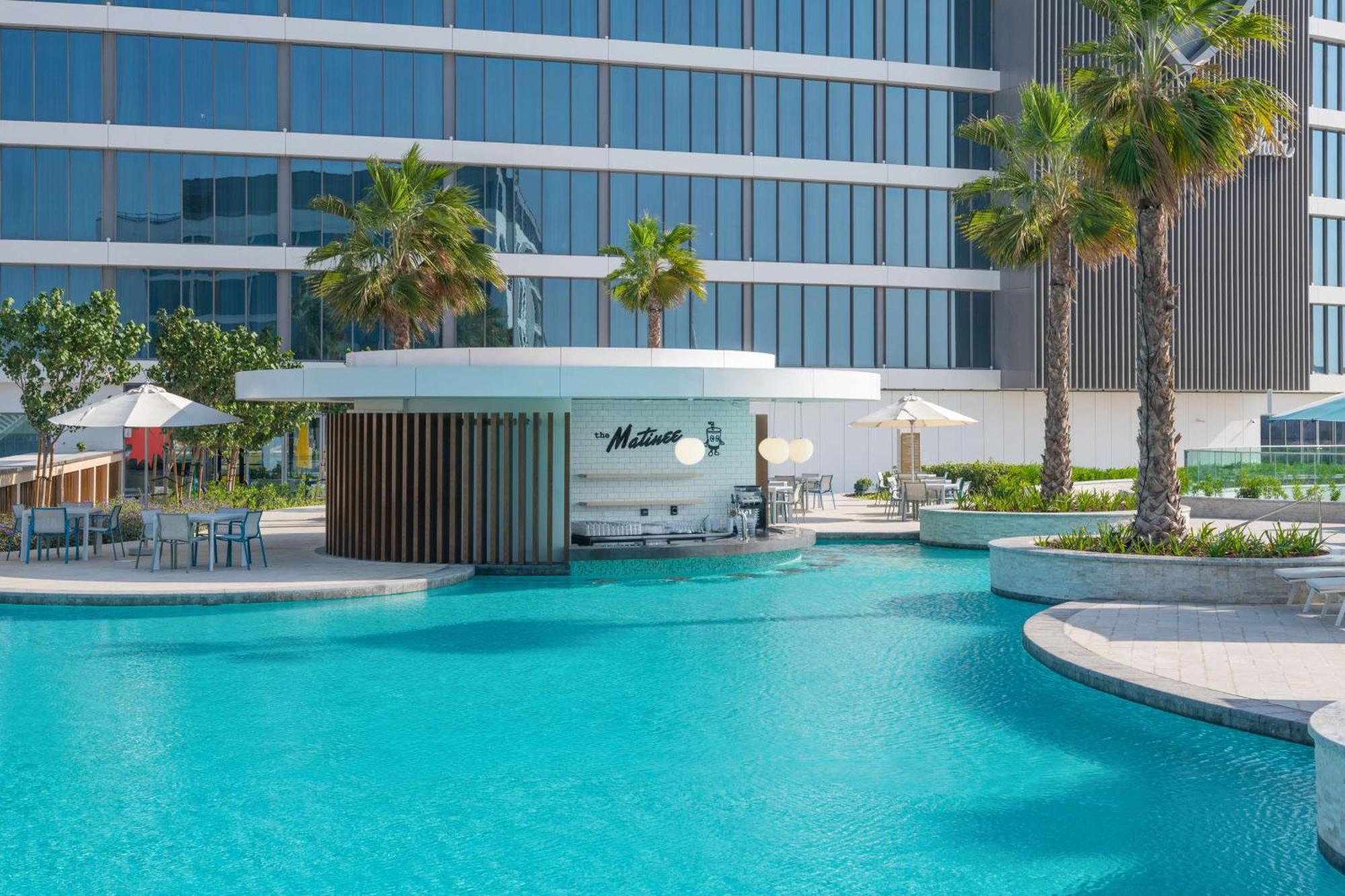 The Wb Abu Dhabi, Curio Collection By Hilton Hotel Exterior photo The swimming pool at the hotel